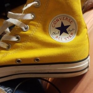 Yellow high top converse